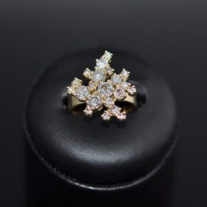 New ring created using the diamonds from a number of pieces no longer worn.